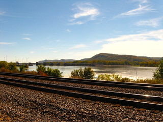 A pair of tracks tracks along the Mississippi.
