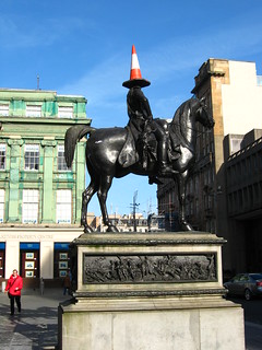 statue of Duke of Wellington on horse, wearing traffic cone