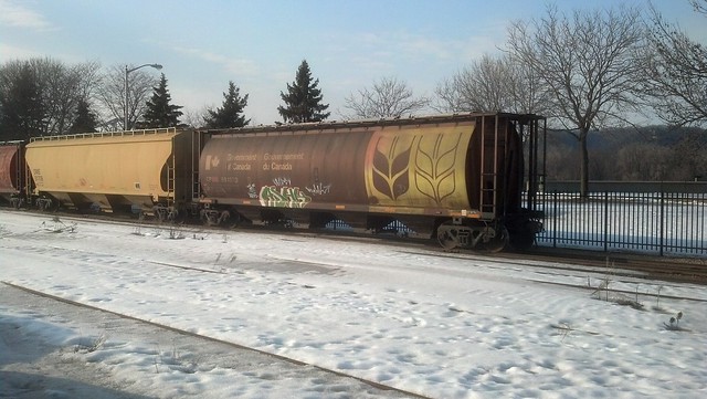 A set of stationary train cars, on melting show