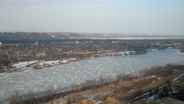 A bird's-eye view of Lake Winona, showing the east end of town. The lake is frozen but starting to melt.